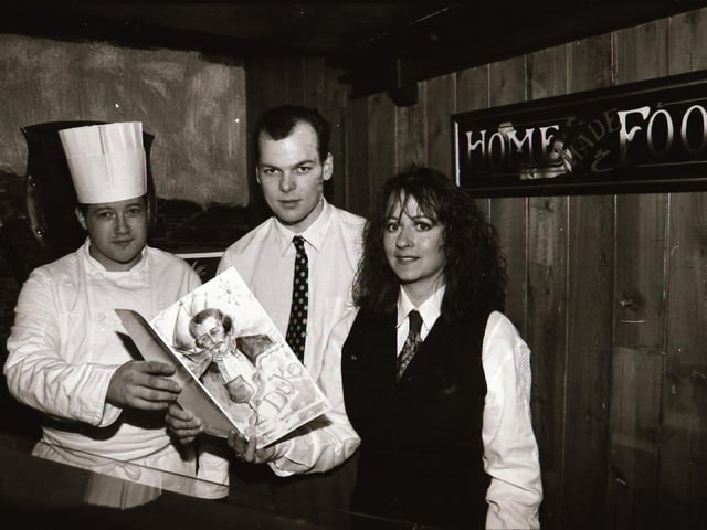 Staff and customers at Duke's Bar in the Waterside.