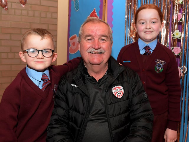 Martin Dunne with Shea and Erin at St John’s PS Grandparents Vintage Tea. Photo: George Sweeney