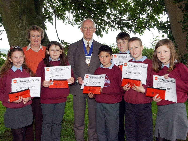 Pupils from Culmore PS who received certificates after taking part in a Spot the Dangers competition. Included, from left, are Niamh McGuire, Elaine Cuthbert, principal, Caroline Gilliland, Albert Smallwoods, Killian Doherty, David Gilliland, Stephen Hiscox and Brigid Johnson.