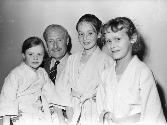 Brian Morton, chair Derry Development Commission, with three young members of Eglinton Judo Club, from left, Jackie Burns, Angela Savage and Belinda Kie, at the opening of the new St. Columb's Park Activity Centre.