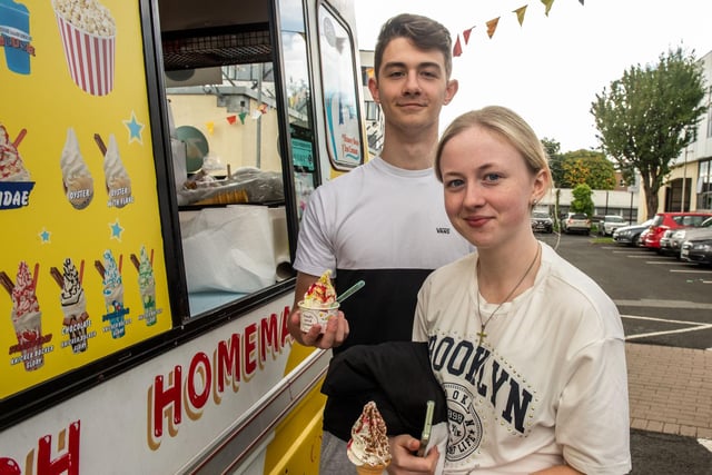 Students Caitlin Barr and Kevin Johnson enjoy some ice cream at Freshers's fest at Strand Road campus. 