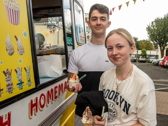 Students Caitlin Barr and Kevin Johnson enjoy some ice cream at Freshers's fest at Strand Road campus. 