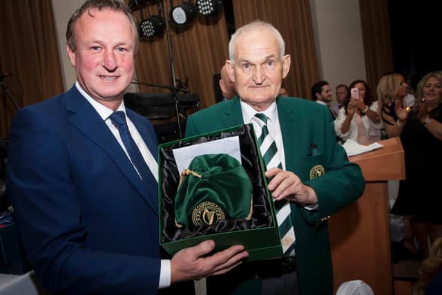 Michael O'Neill presenting a special award to Gerry 'Doc' Doherty at the Foyle Harps 100th anniversary celebrations at the City Hotel in 2016.