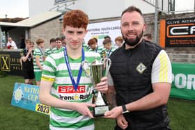 TOTHC captain Conor O'Donnell receives the NIBFA National League U16 Cup