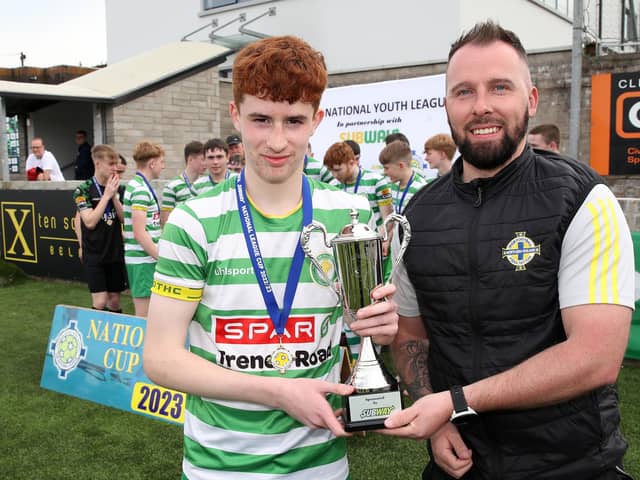 TOTHC captain Conor O'Donnell receives the NIBFA National League U16 Cup