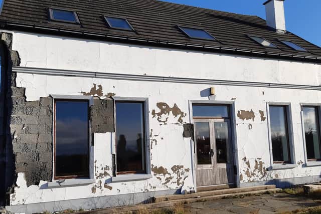 A house in Inch Island, impacted by defective blocks. The house was visited on Wednesday by a team of international experts who also attended the conference.