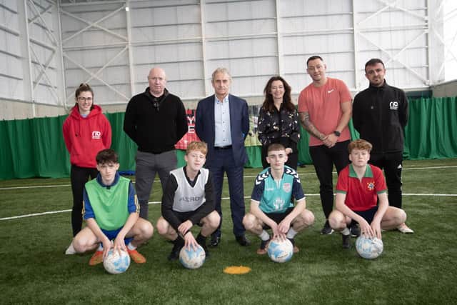 Group pictured at the launch of the Rio Ferdinand Foundation Partnership on Friday last. From left, Aimee Fitzpatrick, 'Beyond The Ball', Fermanagh, Stevie Mallett, manager, North West Youth Services, Paddy Harte, Chair, International Fund for Ireland, Catherine Ryan, manager, International Fund for Ireland, Sean Thornton, Project Co-Ordinator, 'Beyond The Ball', Derry/Donegal and Dan Gorman, Project Co-Ordinator, 'Beyond The Ball' Sligo/Leitrim. Included are front are representatives from some of the youth clubs who took part. The football initiative aims to provide a 'sense of worth and value' to those taking part and the cross-border tournament involved teams from as far away as Leitrim.