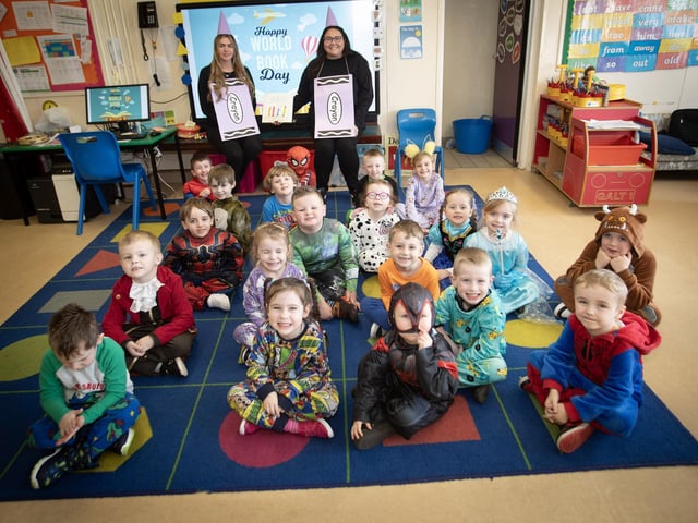 Primary One classes enjoying World Book Day with their LSAs Miss Kirsty Schmid and Miss Nicole Armstrong on Thursday.