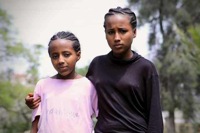 Family Essentials: Yordanos (15), and her sister Qsanet (13), fled war in Ethiopia. They have lived with their family in a refugee camp for three years, and are desperate to return home. They have been supported by Trócaire partner Daughters of Charity. Photo: Trócaire