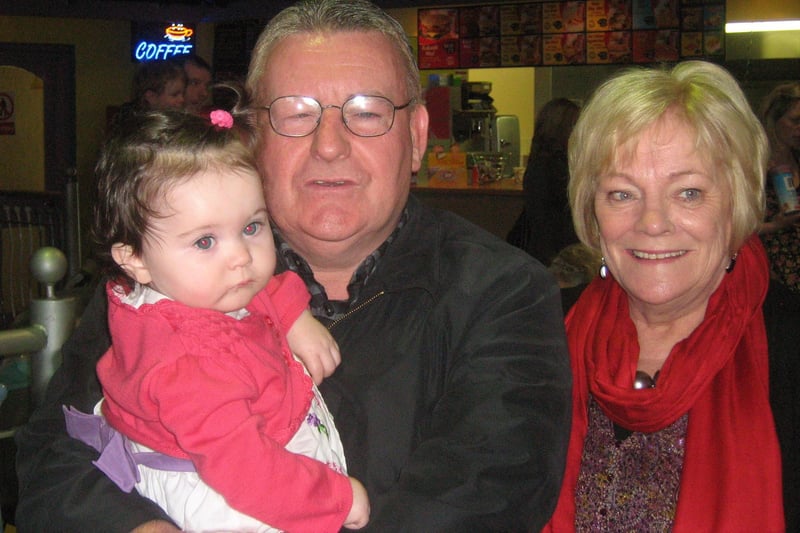 Tony Hassan pictured with his wife Christine and their granddaughter Tara. 