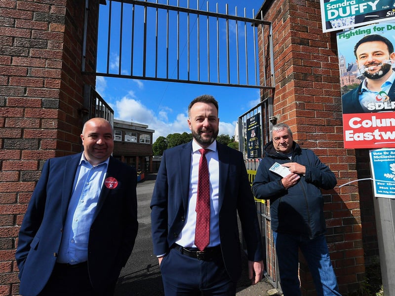 The SDLP leader Colum Eastwood, accompanied by colleague Colr Brian Tierney, leaves The Model Primary School after casting his vote in the Westminster general election.  Photo: George Sweeney.
