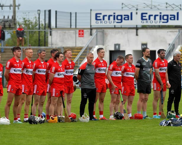 Derry senior hurling manager Johnny McGarvey stands alongside his players.  Photo: George Sweeney.  DER2320GS – 150