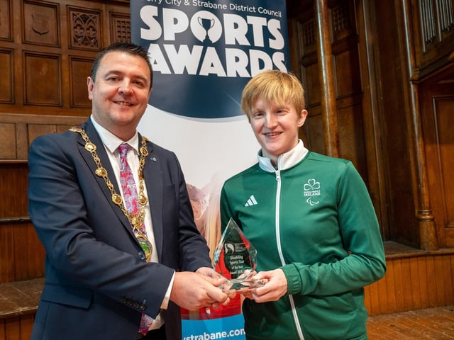 The Mayor, Councillor Ruairí McHugh, presents Chloe MacCombe with the Disability Sports Star of the Year award which she jointly shares with her sister Judith,, as he hosted the annual Derry City and Strabane District Council Sports Awards in the Guildhall. Picture Martin McKeown. 05.06.25