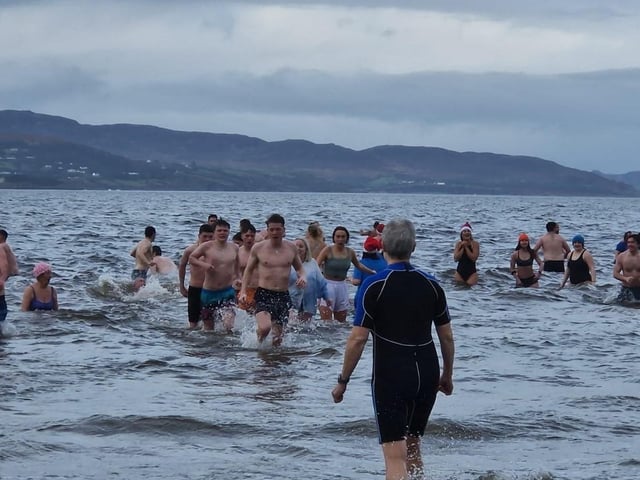 Christmas Day dippers at the annual swim at Ludden beach, Buncrana, County Donegal.