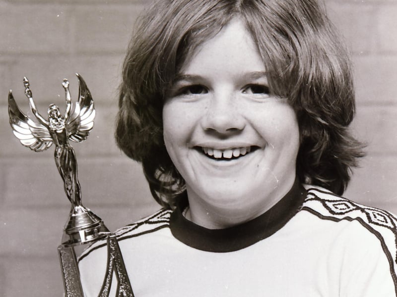 Ann Marie Ramsey with her special award. Ann Marie, an ever present member of the Athletic FC team was the only girl playing in the D&D Youth competitions. She is a sister of the former Athletic player Paul Ramsey, a professional with Leicester City.