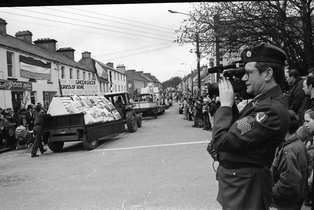 A member of the Defence Forces filming the St. Patrick's Day parade in Moville on March 17, 1993.