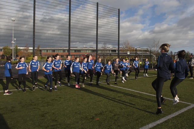 St. Mary’s students put some of the youngsters through a warm-up before the start of their wave at Wednesday’s Primary Schools Duathlon at the college grounds.