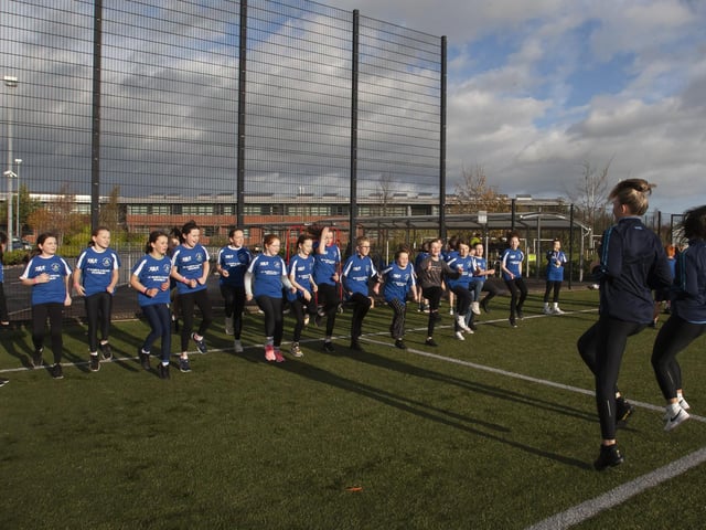 St. Mary’s students put some of the youngsters through a warm-up before the start of their wave at Wednesday’s Primary Schools Duathlon at the college grounds.