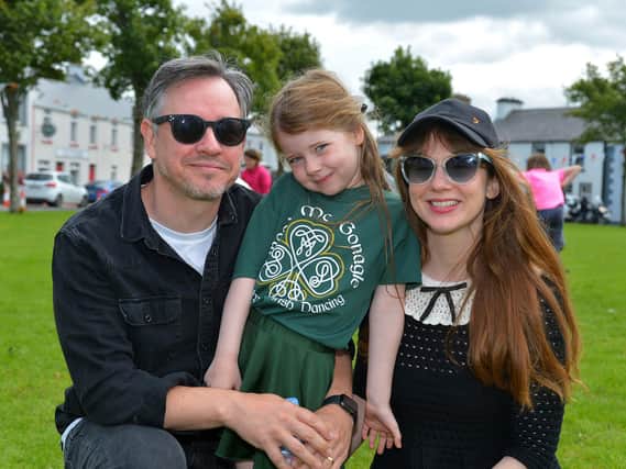 Cahir O’Doherty, Maise O’Doherty and Lyndsay McDougall, from Malin Head, pictured at the Festival on the Green in Malin Town on Sunday afternoon last. Photo: George Sweeney. DER2331GS - 42