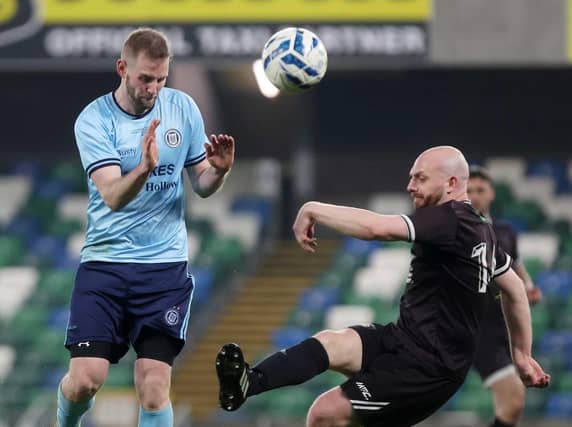 Ardmore defender Anthony Hargan clears the danger during Friday's fonaCAB Craig Stanfield Irish Junior Cup final at Windsor Park. (Photo: IFA)