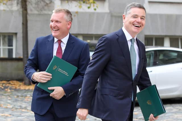 Ireland's Finance Minister Michael McGrath (L) and Ireland's Public Expenditure Minister Paschal Donohoe, pose during a photocall prior to presenting the 2024 Irish Budget to Parliament at Government Buildings in Dublin on October 10, 2023. (Photo by PAUL FAITH / AFP) (Photo by PAUL FAITH/AFP via Getty Images)