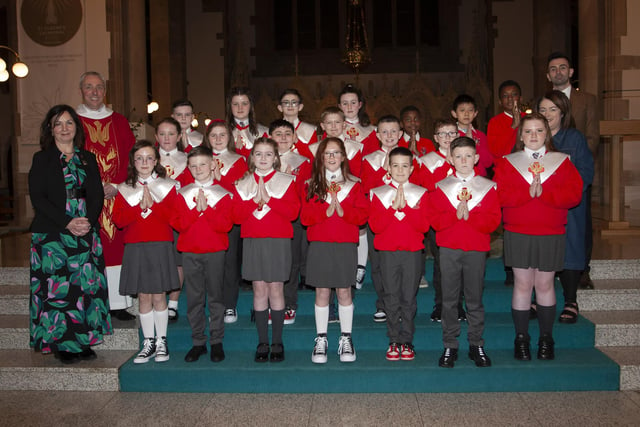 Pupils from St. Eugene’s PS who received the Sacrament of Confirmation from Fr. Paul Farren at St. Eugene’s Cathedral on Friday last. Included is Mrs. Carol Duffy, Principal , Mr. Michael Gilmore, teacher and Mrs. Tara Roddy, Classroom Assistant. (Photo: Jim McCafferty Photography)