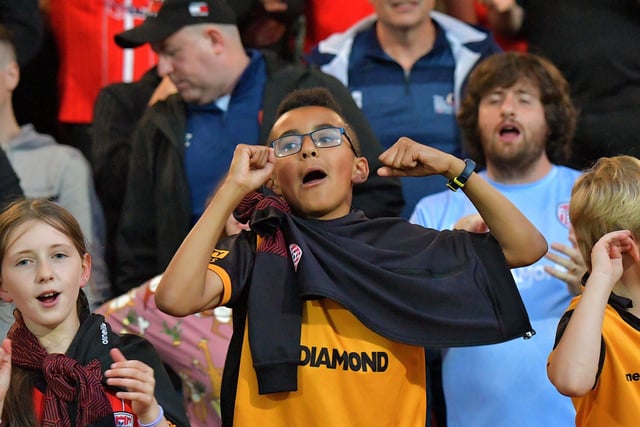 Fans celebrate Derry City’s win over KuPs at the Brandywell. Photo: George Sweeney. DER2330GS -