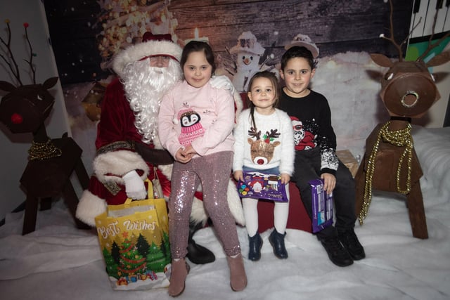 Adrianna, Luca and Ava meeting Santa at Monday night's Foyle Down Syndrome Trust's Annual Christmas Party. (Photos: JIm McCafferty Photography)