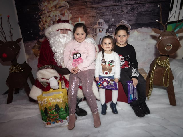 Adrianna, Luca and Ava meeting Santa at Monday night's Foyle Down Syndrome Trust's Annual Christmas Party. (Photos: JIm McCafferty Photography)