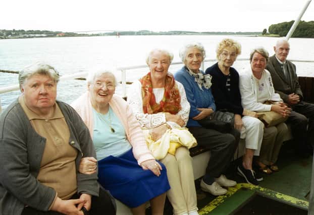 On board the Toucan One for the Golden Link Festival senior citizens boat trip were L/R:- Celine McLaughlin, Ivy Herron, Maisie Craig, Bridie Kelly, Margaret McDuff, Evelyn Gorman and Kenneth Burns. 150803HG20