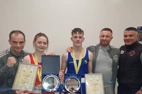 Oakleaf coaches Eugene 'Budge' O'Kane, Aaron Rogan and Christy Doherty pictured with newly crowned Ulster Elite champions, Carleigh Irving and Jack Harkin.