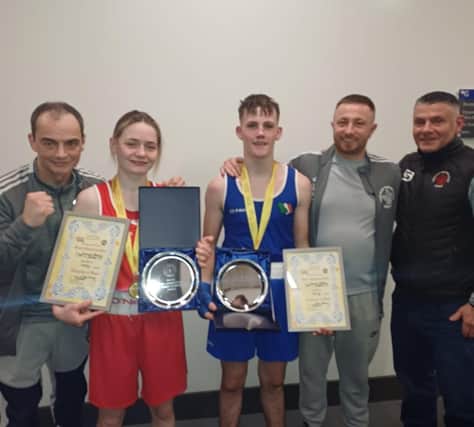 Oakleaf coaches Eugene 'Budge' O'Kane, Aaron Rogan and Christy Doherty pictured with newly crowned Ulster Elite champions, Carleigh Irving and Jack Harkin.