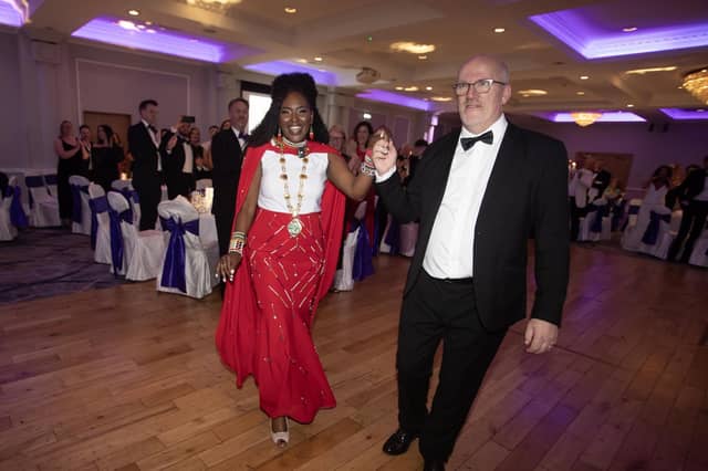 The outgoing Mayor of Derry City & Strabane District Lilian Seenoi Barr and her husband make their way to their seats at Friday night's Mayor's Charity Ball in aid of The Bud Club in the Everglades Hotel.