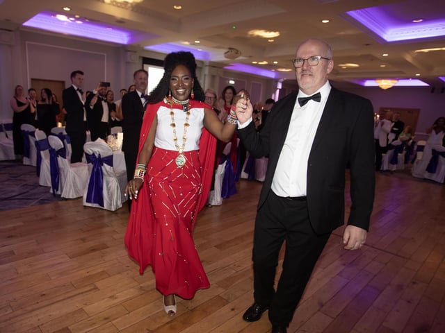 The outgoing Mayor of Derry City & Strabane District Lilian Seenoi Barr and her husband make their way to their seats at Friday night's Mayor's Charity Ball in aid of The Bud Club in the Everglades Hotel.
