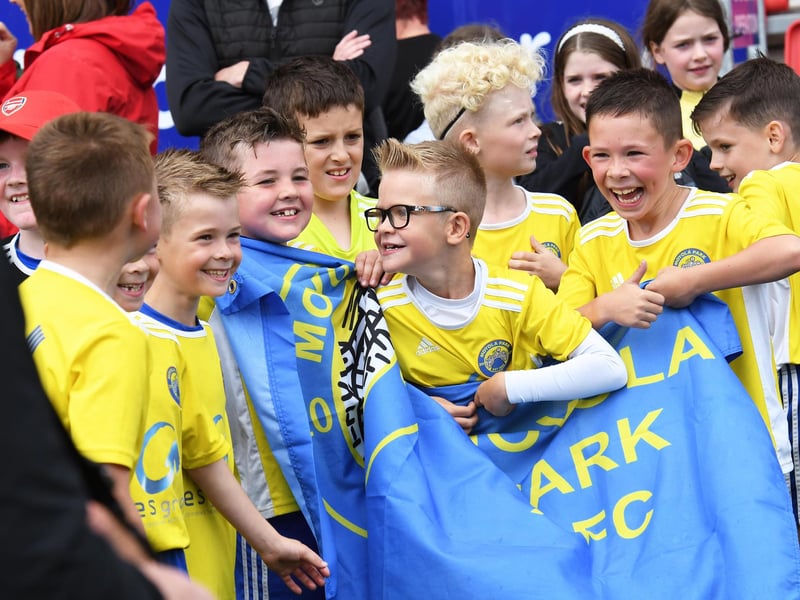 The Moyola Park Under-8's celebrate their O'Neill's Foyle Cup triumph at The Brandywell. (Photo: Keith Moore)