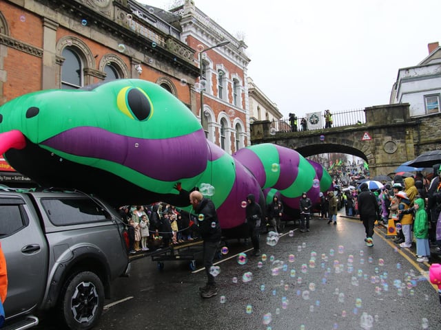 The giant snake makes arriving at Guildhall Square on St. Patrick’s Day. (Photo - Deirdre Heaney, nwpresspics)