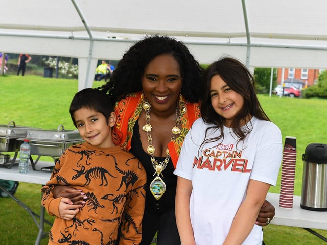 Mayor Lilian Seenoi Barr pictured with young friends at the North West Migrant Forum’s Fun Day held in Brooke Park on Sunday. Photo: George Sweeney