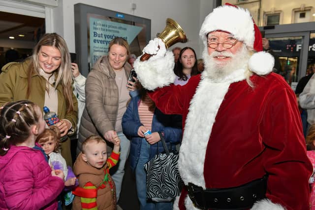 Santa arrives at the Richmond Shopping Centre on Saturday morning. Photo: George Sweeney