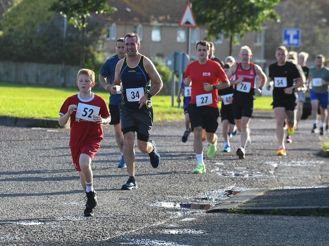 Competitors take part in the inaugural Galliagh Féile 5K road race on Friday evening. Photo: George Sweeney