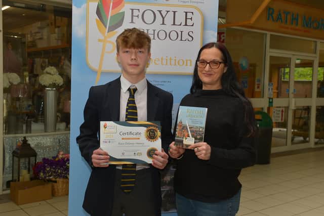 2023: Lumen Christi College pupil, Reece Delaney-Heaney, pictured with sponsor Jenni Doherty, Little Acorns Bookstore, was awarded First Place in the KS3 My Community category in the inaugural Foyle Schools Poetry Competition. Photo: George Sweeney.  DER2313GS – 41