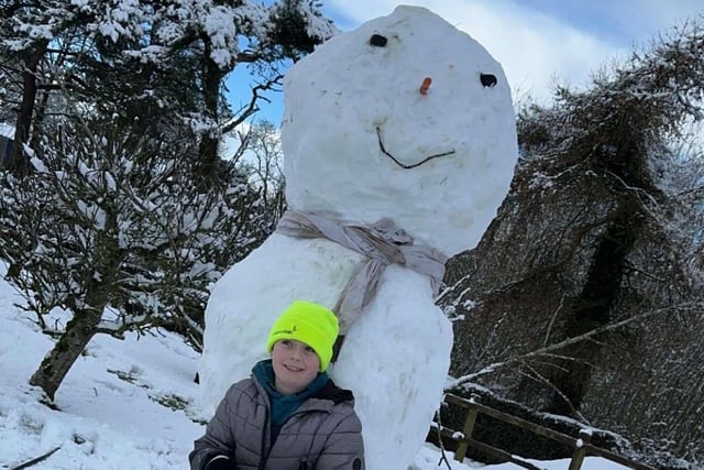 Tiernan with a very impressive snowman.