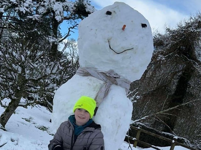 Tiernan with a very impressive snowman.