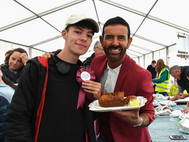 Callum McGonagle, winner of the best tea scone baker at the Muff Féile, pictured with Mickey Doherty. Photo: George Sweeney