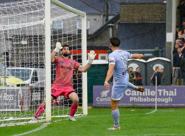 Derry City new signing Tadhg Ryan is beaten by Matty Smith during last season's win for the Brandywell men at Bohemians.