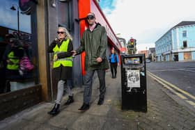 Mark Durkan, MLA, with an RNIB volunteer on the Strand Road.