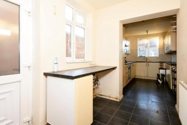 The kitchen also features this utility space, which is sure to come in handy.