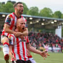 Liam Boyce, celebrating his first goal for Derry with Michael Duffy, is loving life at Brandywell.