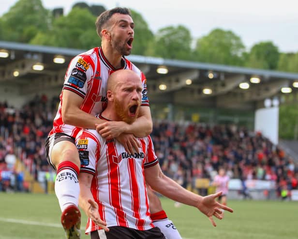 Liam Boyce, celebrating his first goal for Derry with Michael Duffy, is loving life at Brandywell.