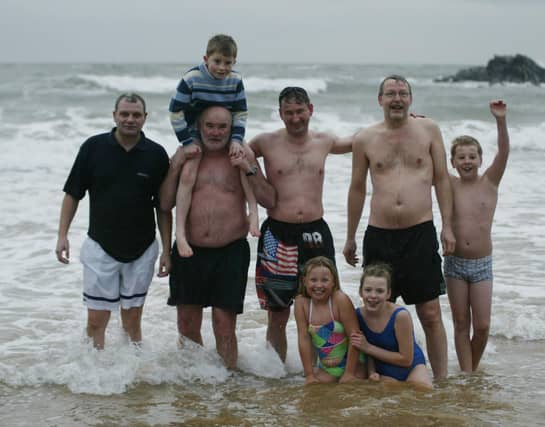 Some of the many bathers who participated in the New Years Day swim at Culdaff. (0301JB11)