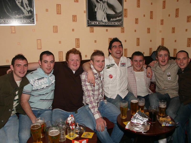 Stuart seated second left with a group of mates at the 21st party in Phoneix 2133/dd : .